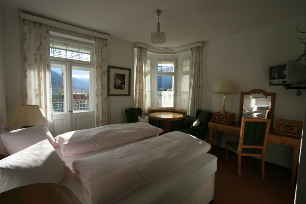 Hotel Alpina Davos Pokoj fotografie